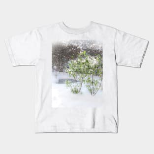 Fresh snow in garden with heart shaped pond Kids T-Shirt